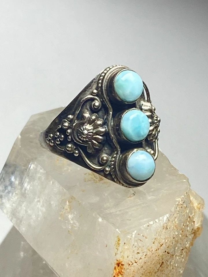 LARIMAR RING LONG CIGAR BAND STERLING SILVER WOMEN: LARIMAR RING LONG CIGAR BAND STERLING SILVER WOMEN Larimar ring long cigar band sterling silver women Size 7.50 Between a size 7.50 and a size 7.75 Weight 4.9g Widest part 7/8" Thinnest part of band 1