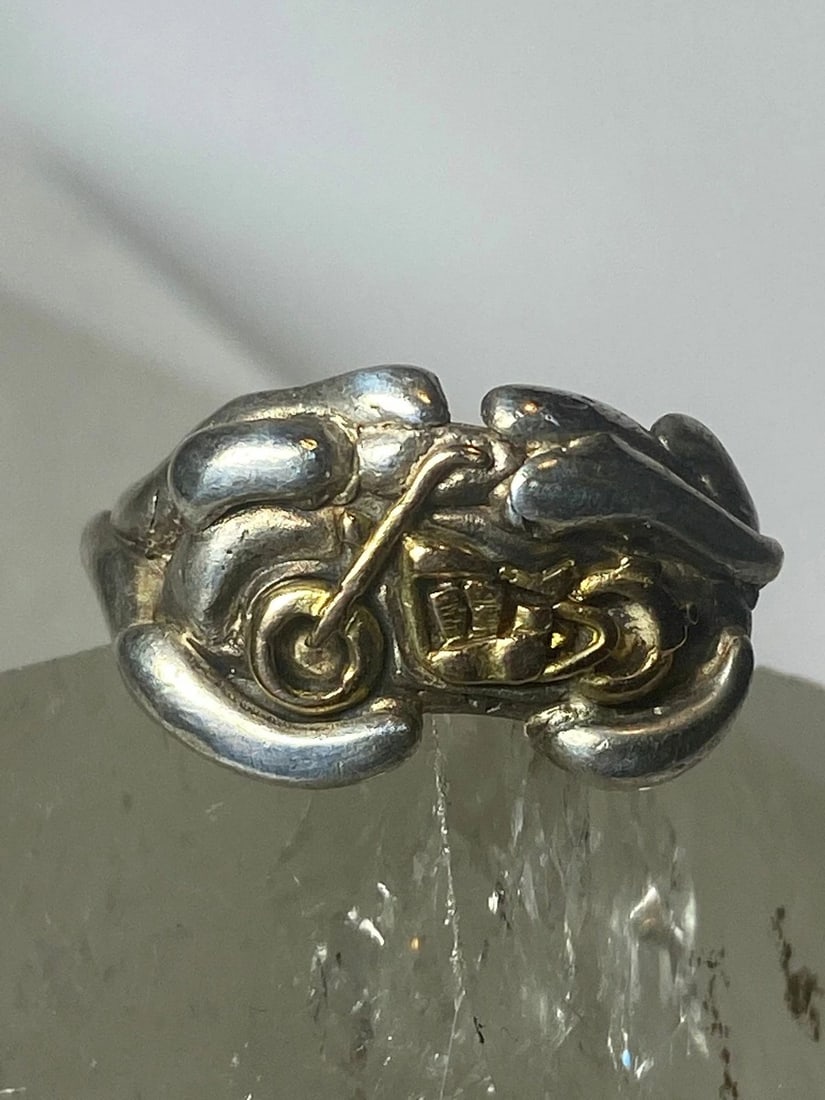 MOTORCYCLE RING BIKER BAND SOUTHWEST STERLING SILVER WOMEN MEN 2: MOTORCYCLE RING BIKER BAND SOUTHWEST STERLING SILVER WOMEN MEN 2 Motorcycle ring biker band southwest sterling silver women men 2 some unknown metal over the sterling silver on the motorcycle Size 8.7