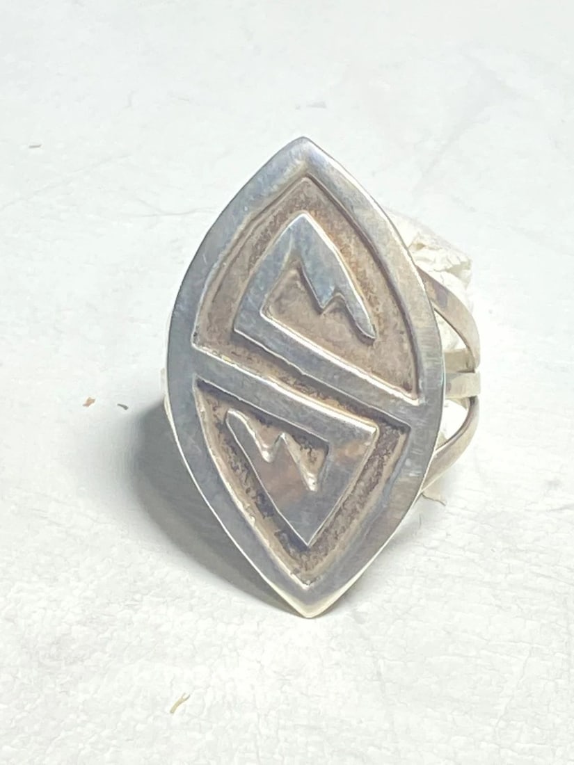 HOPI RING LONG SYMBOLS STERLING SILVER WOMEN GIRLS: HOPI RING LONG SYMBOLS STERLING SILVER WOMEN GIRLS Hopi ring long symbols sterling silver women girls Size 8.25 Weight 5.2g Length. 1 1/4" Width 3/4" Thinnest part of band 1/8"