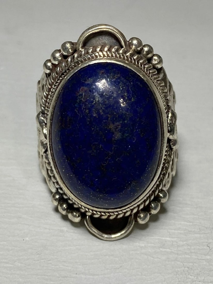 BLUE LAPIS RING SIZE 7.50 TRIBAL STERLING SILVER WOMEN MEN: BLUE LAPIS RING SIZE 7.50 TRIBAL STERLING SILVER WOMEN MEN Blue Lapis ring tribal sterling silver women men Size 7.50 Between a size 7.50 and a size 7.75 weight 17.8g Length 1. 1/8" Width. 1/2" Thinne