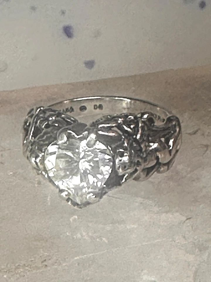 CHERUB RING KABANA WITH WINGS HEART CZ LOVE VALENTINE SIZE 6 STERLING SILVER WOM: CHERUB RING KABANA WITH WINGS HEART CZ LOVE VALENTINE SIZE 6 STERLING SILVER WOM Cherub ring Kabana with wings heart CZ Love Valentine size 6 sterling silver women Size 6 Weight 5.7g Width 3/8" Thinne
