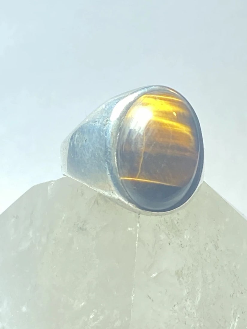 TIGER EYE RING CIGAR BAND MEXICO STERLING SILVER SOUTHWEST WOMEN MEN: TIGER EYE RING CIGAR BAND MEXICO STERLING SILVER SOUTHWEST WOMEN MEN Tiger Eye ring cigar band Mexico sterling silver southwest women men Size 11.50 Weight. 10.6g Length 3/4" Width. 1/2" Thinnest part