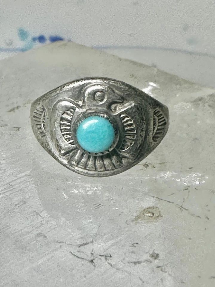 NAVAJO PHOENIX RING TURQUOISE SIZE 4.75 STERLING SILVER BELL TRADING WOMEN GIRLS: NAVAJO PHOENIX RING TURQUOISE SIZE 4.75 STERLING SILVER BELL TRADING WOMEN GIRLS Navajo Phoenix ring turquoise size 4.75 sterling silver Bell trading women girls Size 4.75 Weight 3.1g Width 1/2" Thinn