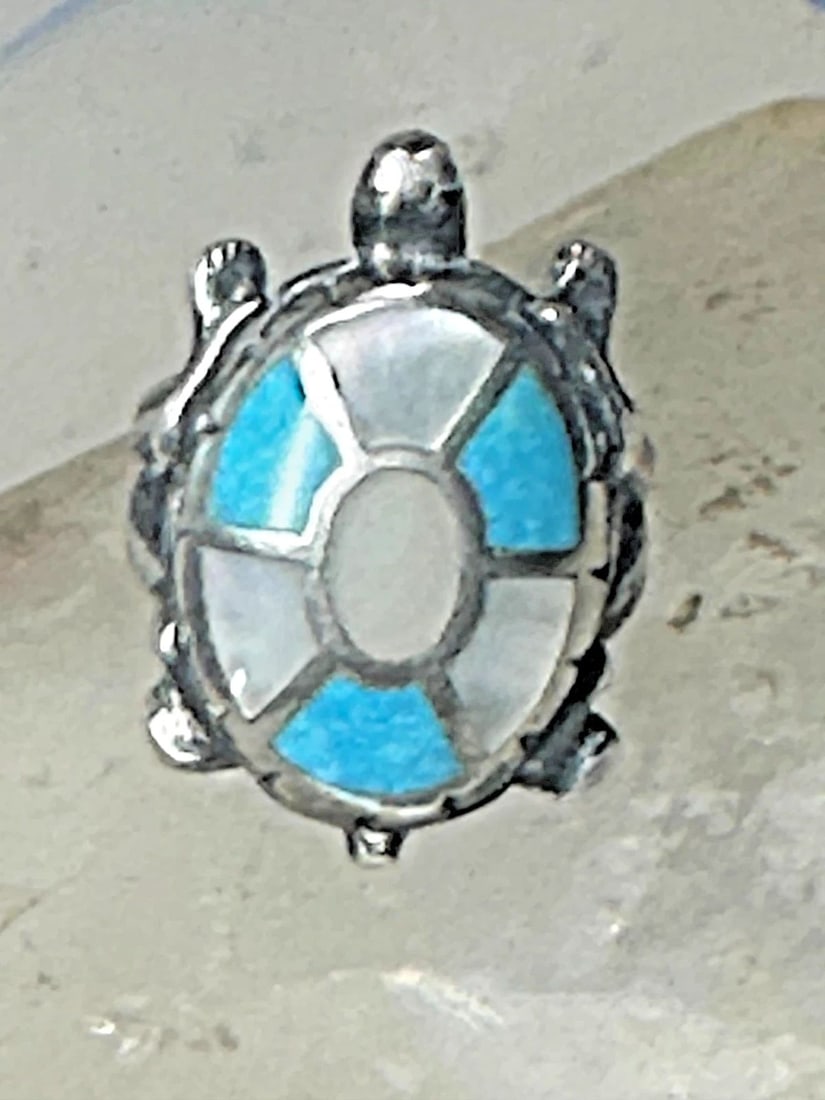 ZUNI TURTLE RING SIZE 5 TURQUOISE MOTHER OF PEARL STERLING SILVER WOMEN GIRLS: ZUNI TURTLE RING SIZE 5 TURQUOISE MOTHER OF PEARL STERLING SILVER WOMEN GIRLS Zuni Turtle ring size 5 turquoise Mother of pearl sterling silver women girls Size 5 Weight 8g Length 1" Width 5/8" Thinne