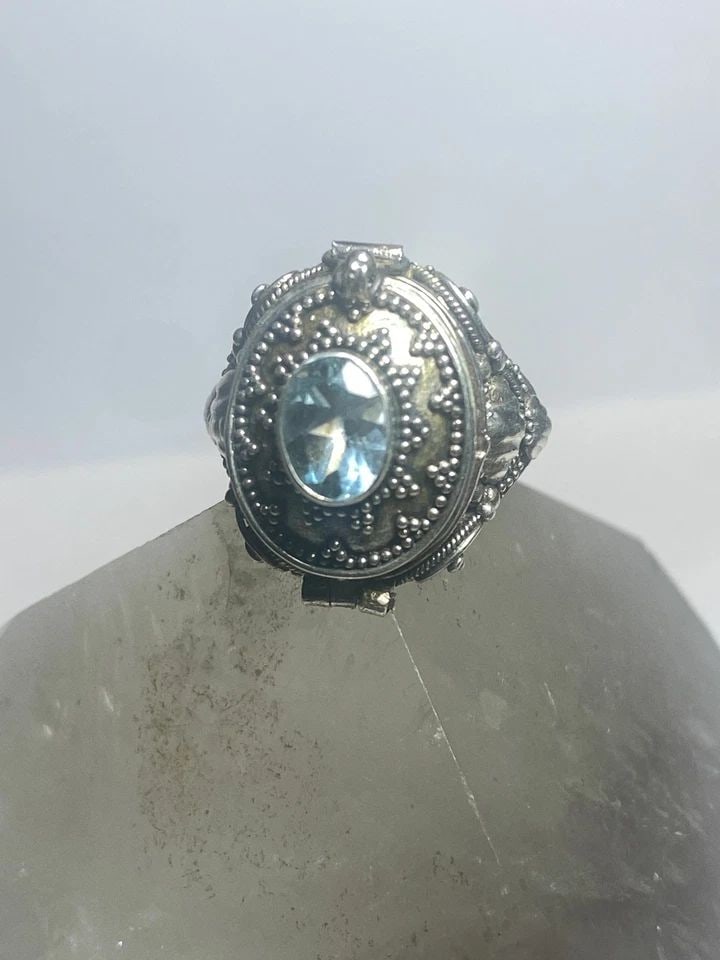 POISON RING BEADED LIGHT BLUE STONE STERLING SILVER WOMEN GIRLS: POISON RING BEADED LIGHT BLUE STONE STERLING SILVER WOMEN GIRLS Poison ring beaded light blue stone sterling silver women girls Size 7.75 Weight 6.9g Length 7/8" Width 1/2" Thinnest back of band 5/32"