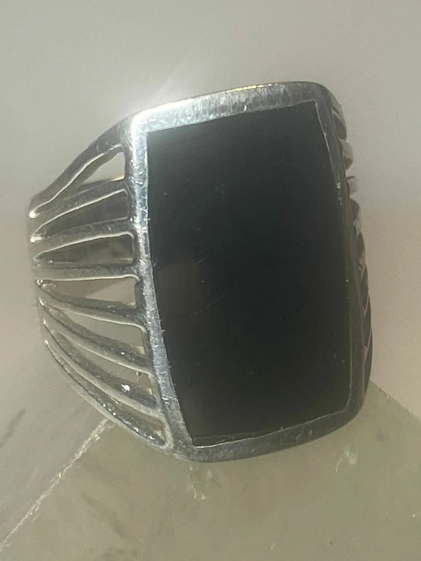 ONYX RING SOUTHWEST BAND WIDE STERLING SILVER WOMEN GIRLS: ONYX RING SOUTHWEST BAND WIDE STERLING SILVER WOMEN GIRLS Onyx ring southwest band wide sterling silver women girls Size 6.50 Weight 5.4g Length. 3/4" Widest part 1/2" Thinnest part 1/4"