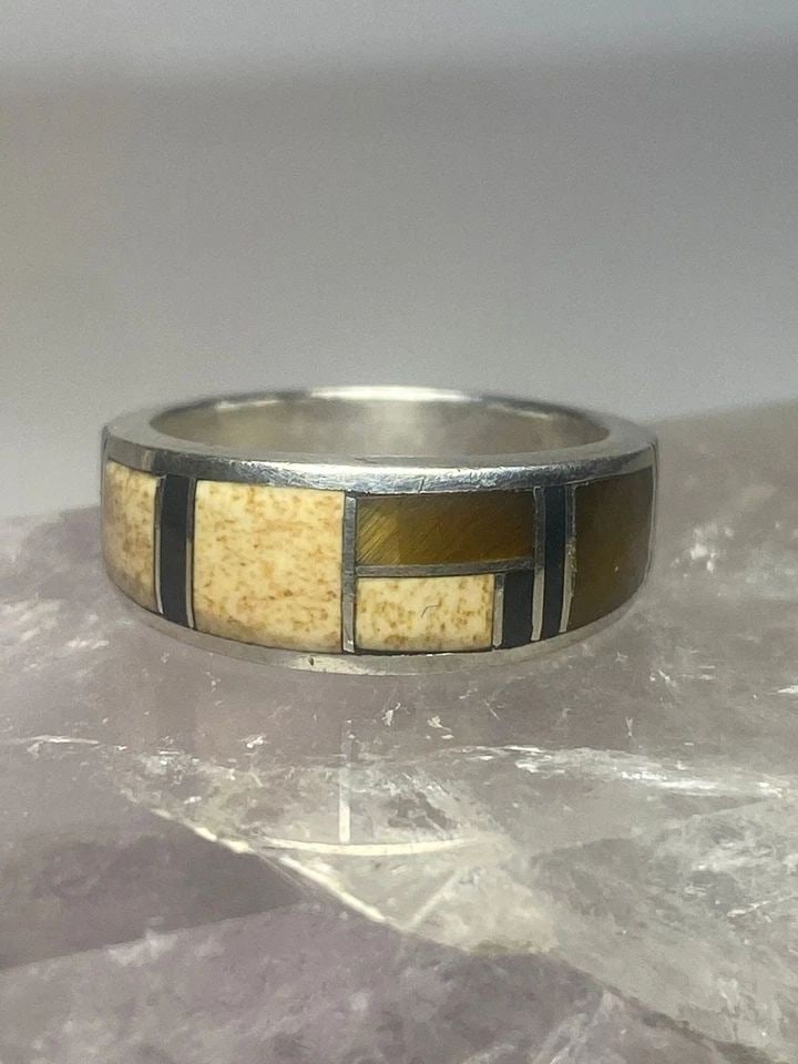 TIGER EYE RING SOUTHWEST BAND PINKY STERLING SILVER WOMEN GIRLS: TIGER EYE RING SOUTHWEST BAND PINKY STERLING SILVER WOMEN GIRLS Tiger eye ring southwest band pinky sterling silver women girls Size 5.25 Weight 3.9g Widest part 1/4" Thinnest part. 1/8"