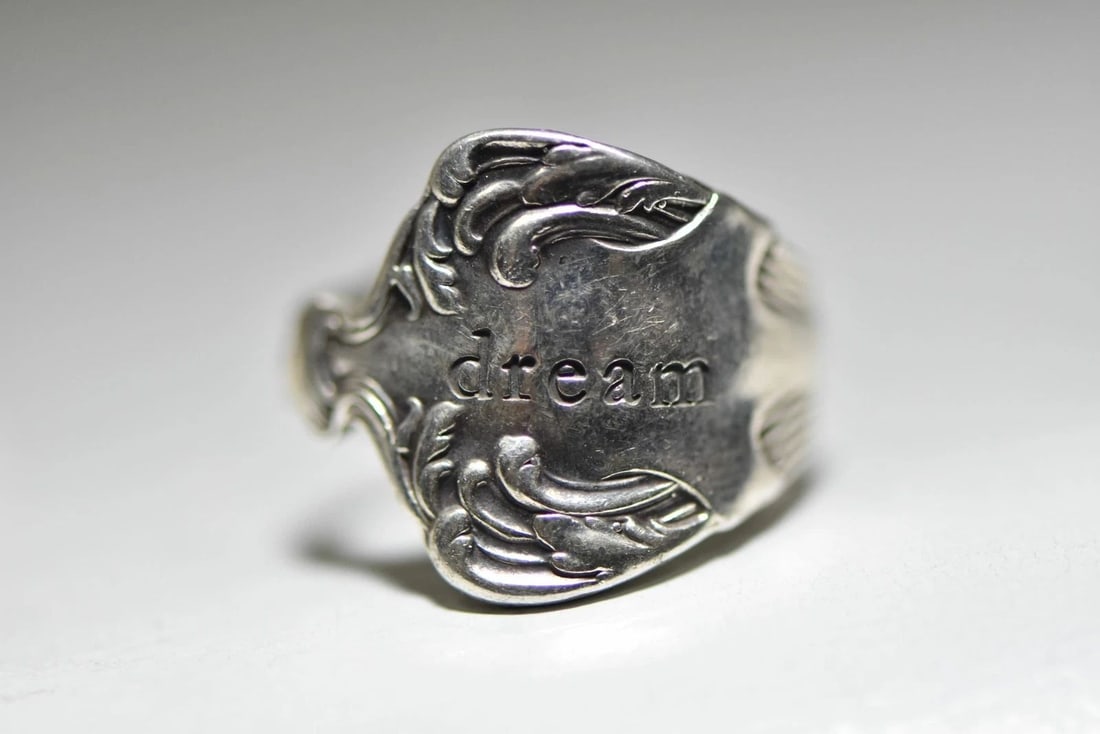 SPOON RING DREAM MAKE IT HAPPEN BAND WIDE STERLING SILVER WOMEN GIRLS: SPOON RING DREAM MAKE IT HAPPEN BAND WIDE STERLING SILVER WOMEN GIRLS Spoon ring Dream Make it Happen band wide sterling silver women girls Size 6.25 Between a size 6.25 and a size 6.50 Weight 9g Wide