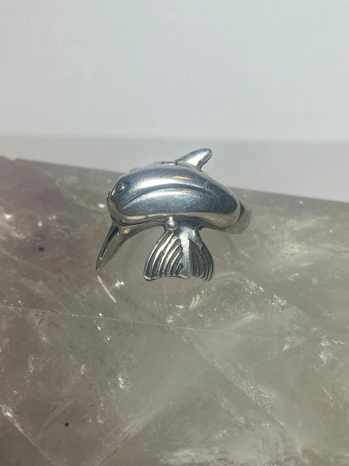 DOLPHIN RING POISON BAND STERLING SILER WOMEN GIRLS: DOLPHIN RING POISON BAND STERLING SILER WOMEN GIRLS Dolphin ring poison band sterling silver women girls Size 6.75 Weight 5.5g Width 7/8" Thinnest part. 1/8"