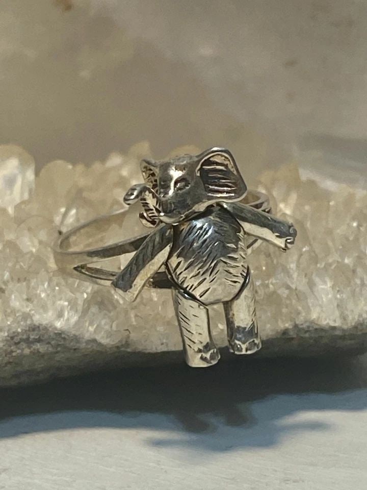 ELEPHANT RING SIZE 8.75 MOVING BAND STERLING SILVER WOMEN GIRLS: ELEPHANT RING SIZE 8.75 MOVING BAND STERLING SILVER WOMEN GIRLS Elephant ring moving band sterling silver women girls Size 8.75 Weight 4.8g Length. 7/8" Width 1/2" Thinnest part of band 3/32"