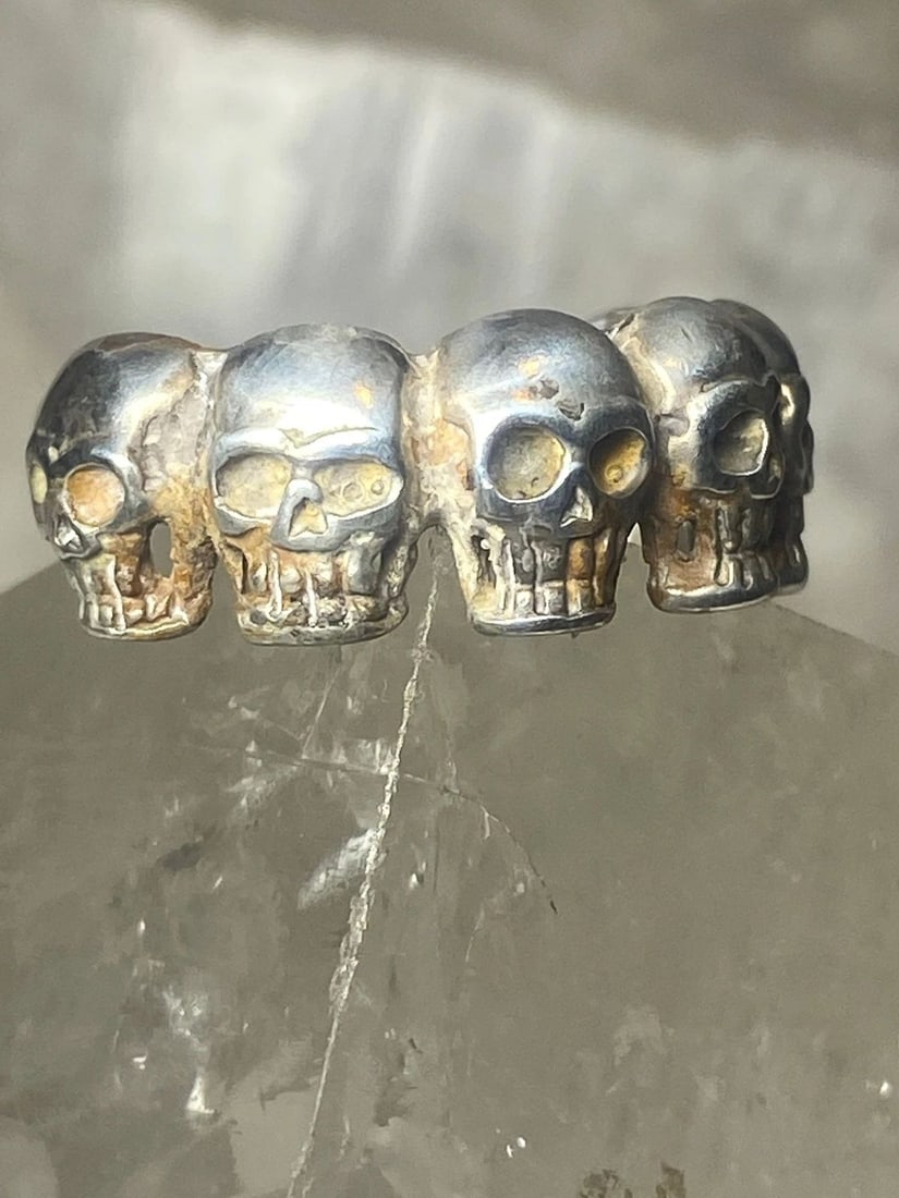 SKULL RING SKULLS BAND STERLING SILVER BIKER WOMEN MEN: SKULL RING SKULLS BAND STERLING SILVER BIKER WOMEN MEN Skull ring skulls band sterling silver biker women men Size 8.75 Weight 6.9g Width 3/8" Thinnest part 3/16"