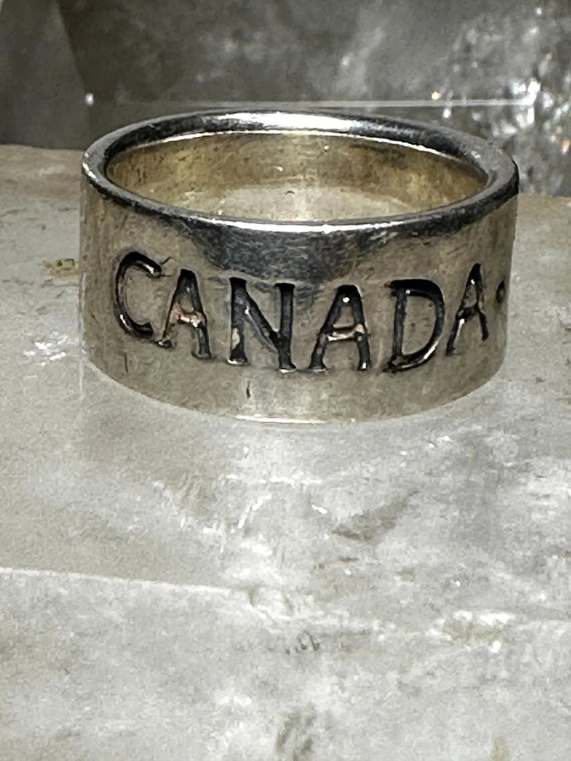 CANADA RING WORD BAND SIZE 6.75 STERLING SILVER WOMEN MEN: CANADA RING WORD BAND SIZE 6.75 STERLING SILVER WOMEN MEN Canada ring word band size 6.75 sterling silver women men Size 6.75 Weight. 8.9g Width 3/8"