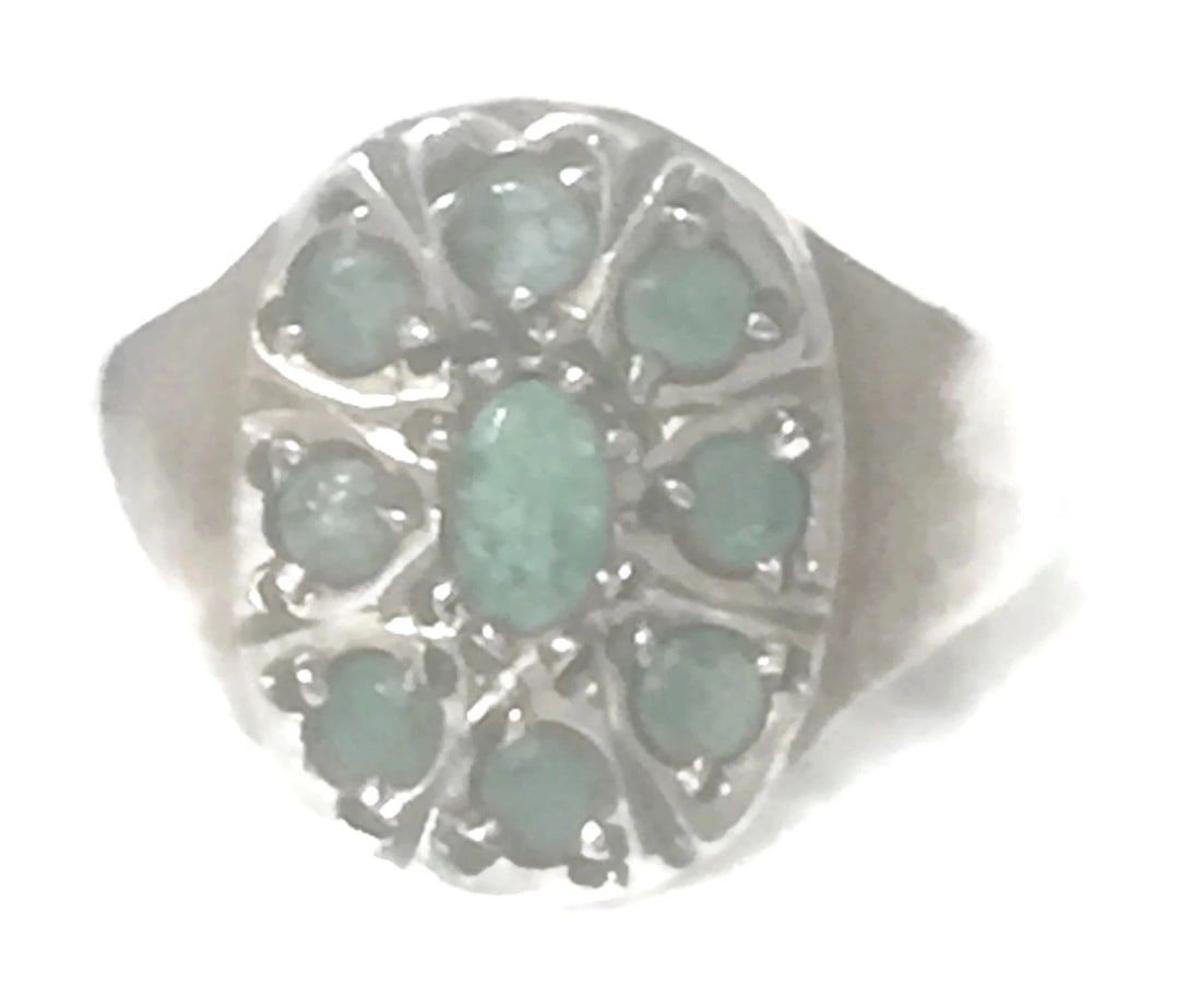 EMERALD GREEN RING COCKTAIL STERLING SILVER BOHO RING SIZE 7.50: EMERALD GREEN RING COCKTAIL STERLING SILVER BOHO RING SIZE 7.50 Emerald Green Vintage Sterling Silver Ring Rough Emerald Stones Size 7.50 Weight 5.9g Widest Part of Band 5/8"