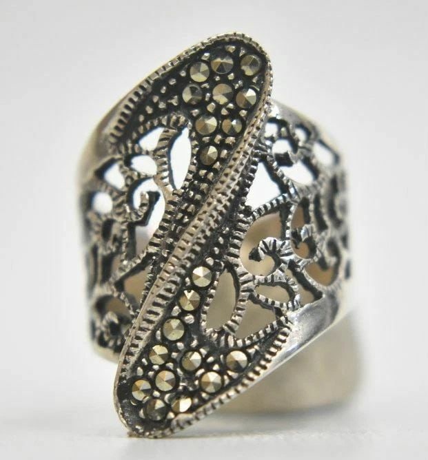 LONG MARCASITE RING STERLING SILVER CIGAR BAND SIZE 6.50: LONG MARCASITE RING STERLING SILVER CIGAR BAND SIZE 6.50 Marcasite Ring Art Deco Sterling Silver Cigar Band Size 6.50 Weight 6.7g Widest Part of Band 1" Thinnest Part of Band 1/4"