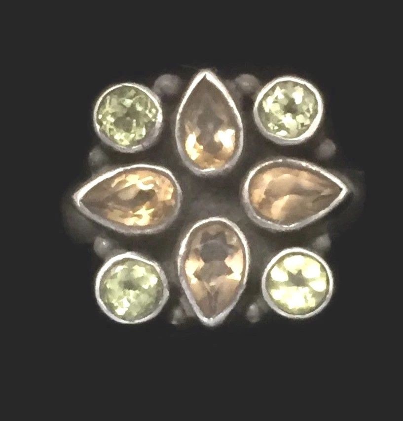 VINTAGE PERIDOT YELLOW TOPAZ STERLING SILVER RING PINKY BAND SIZE 4.7 GIRLS: VINTAGE PERIDOT YELLOW TOPAZ STERLING SILVER RING PINKY BAND SIZE 4.7 GIRLS Vintage Peridot Topaz Ring Sterling Silver Band Ring Size 4.75 Weight 4.3g Widest Part of Ring 9/16" Thinnest Part of Ring