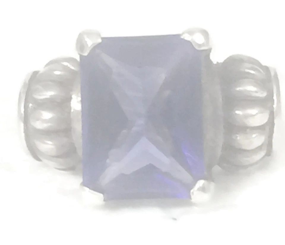 VINTAGE PURPLE FACETED RING STERLING SILVER SIZE 5.75: VINTAGE PURPLE FACETED RING STERLING SILVER SIZE 5.75 Vintage Purple Faceted Ring Sterling Silver Size 5.75 Weight 6.9g Widest Part of Band 1/2" Thinnest Part of Band 1/8" Rings are delivered in a Gif