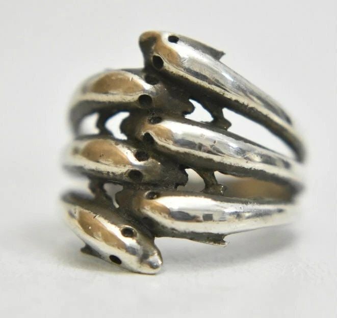 DOLPHIN RING SIX DOLPHINS OCEAN SEAS PINKY BAND STERLING SILVER WOMEN SIZE 5.75: DOLPHIN RING SIX DOLPHINS OCEAN SEAS PINKY BAND STERLING SILVER WOMEN SIZE 5.75 Dolphin ring six dolphins ocean seas pinky band sterling silver women Size 5.75 Weight 4g Widest part of band 3/4" Thinn