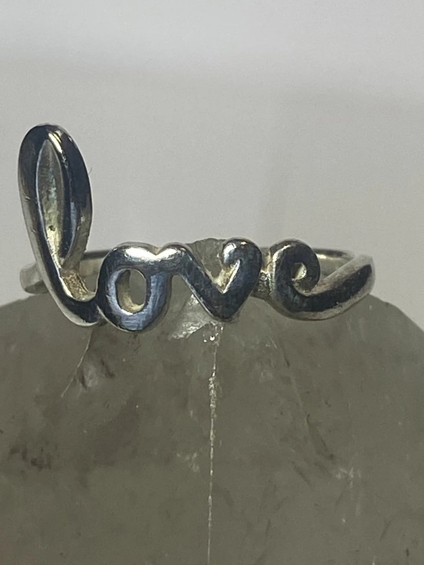LOVE RING FRIENDSHIP WORD HEART VALENTINE PINKY BAND STERLING SILVER WOMEN GIRL: LOVE RING FRIENDSHIP WORD HEART VALENTINE PINKY BAND STERLING SILVER WOMEN GIRL Love ring Valentine pinky band sterling silver women girl Size 5.50 Weight 1.9g Widest part 7/16" Thinnest part 1/8"