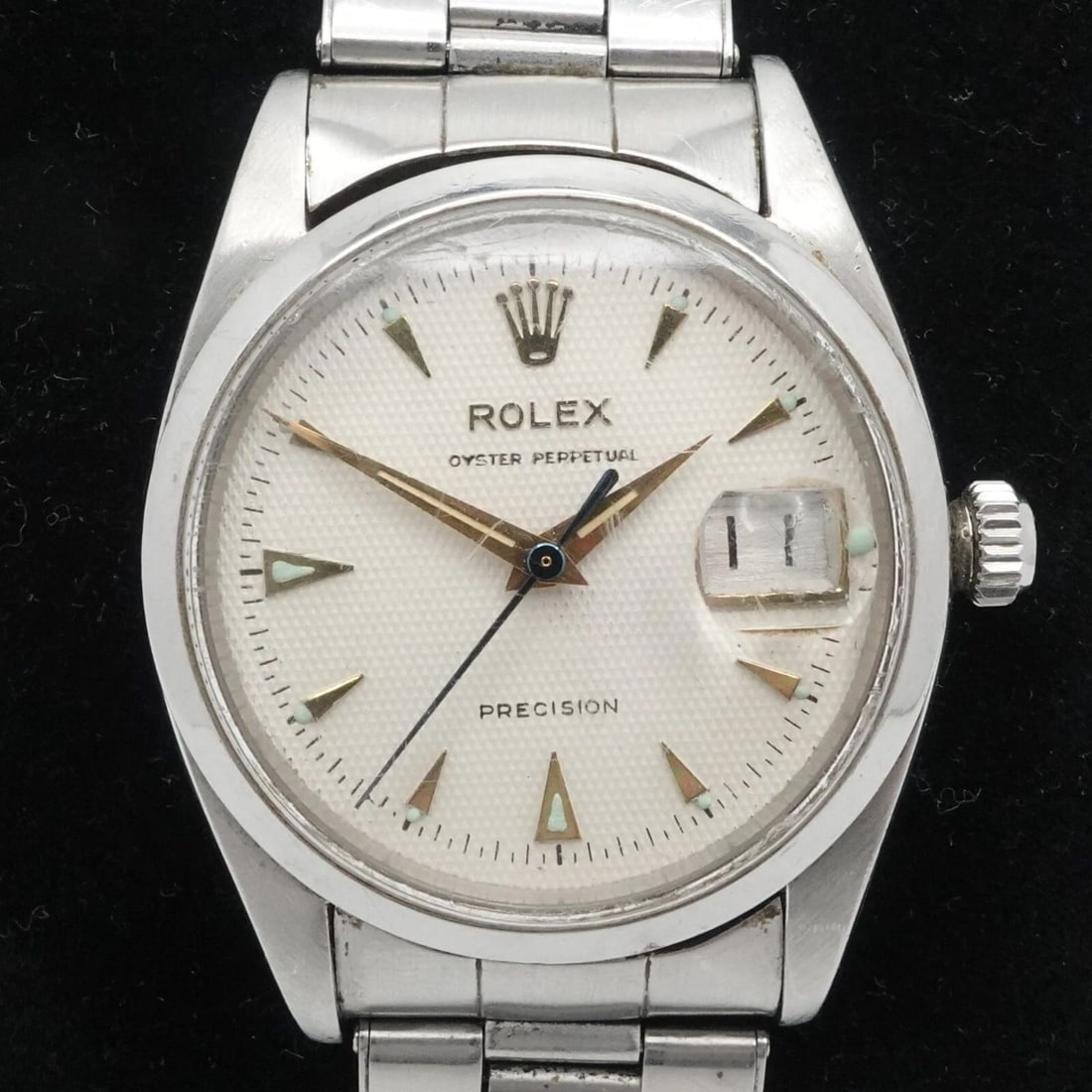 ROLEX OYSTER PERPETUAL DATE 6494 STAINLESS STEEL MANUAL WATCH - 34MM: ROLEX OYSTER PERPETUAL DATE 6494 STAINLESS STEEL MANUAL WATCH - 34MM Rolex Oyster Perpetual Date Reference 6494 Serial # 457** Stainless Steel Honeycomb Dial Manual Watch Case Size - 34mm Fits up to 7