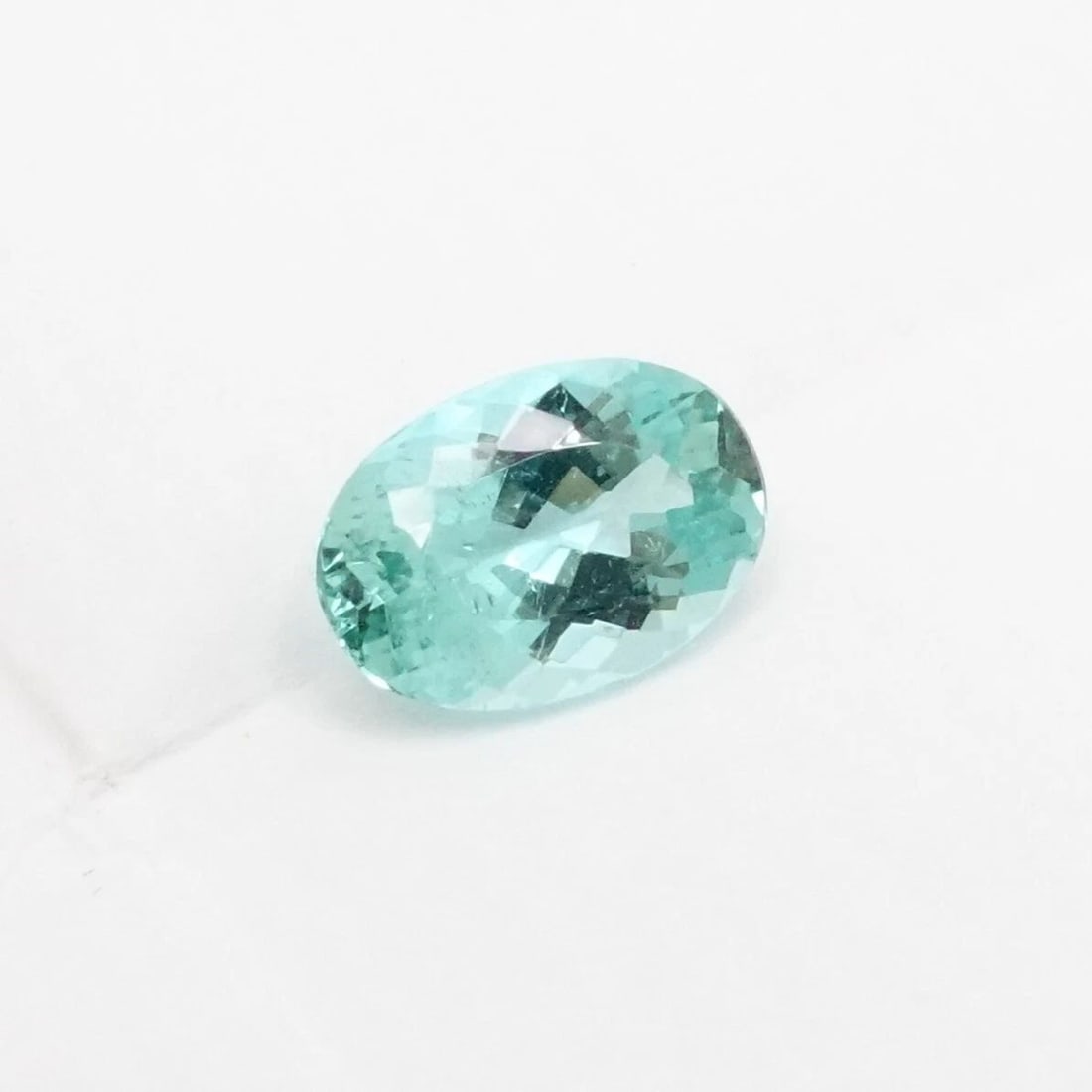 1.45 CARAT BLUE GREEN NATURAL TOURMALINE OVAL LOOSE GEMSTONE - AGL CERTIFIED: 1.45 CARAT BLUE GREEN NATURAL TOURMALINE OVAL LOOSE GEMSTONE - AGL CERTIFIED 1.45 Carat Blue-Green Natural Tourmaline Oval Modified Brilliant Cut Loose Gemstone AGL Certified Measurements - 9.03 x 6.2