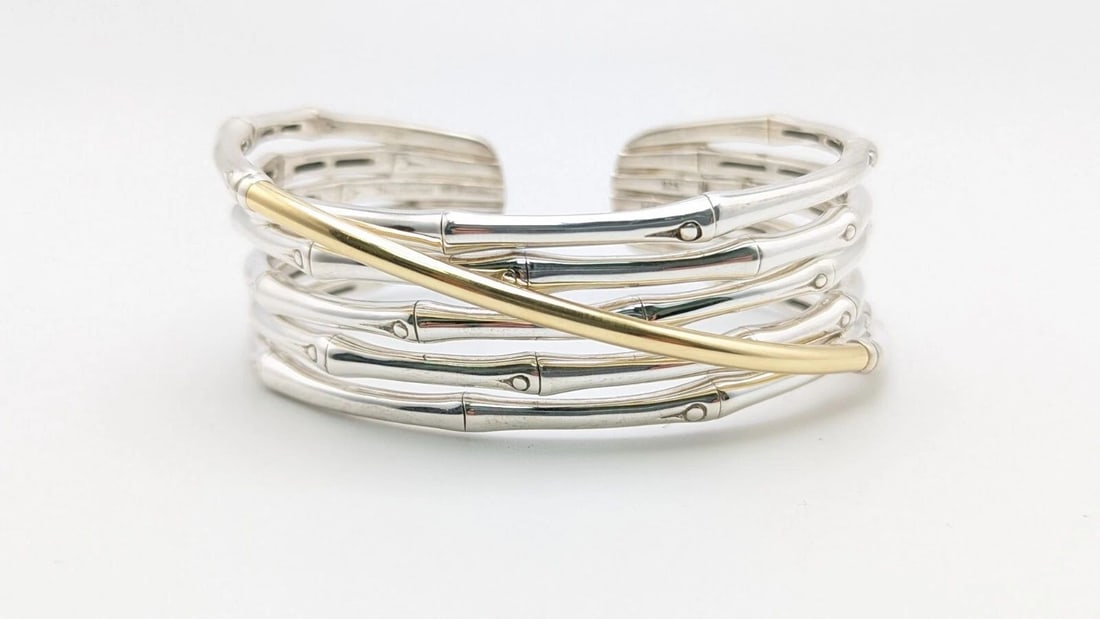 JOHN HARDY STERLING SILVER & 18K YELLOW GOLD BAMBOO CUFF BRACELET SIZE MEDIUM: JOHN HARDY STERLING SILVER & 18K YELLOW GOLD BAMBOO CUFF BRACELET SIZE MEDIUM John Hardy Sterling Silver & 18K Yellow Gold Bamboo Cuff Bracelet Size Medium Total Weight - 67.8 Grams Width - 22mm Profe