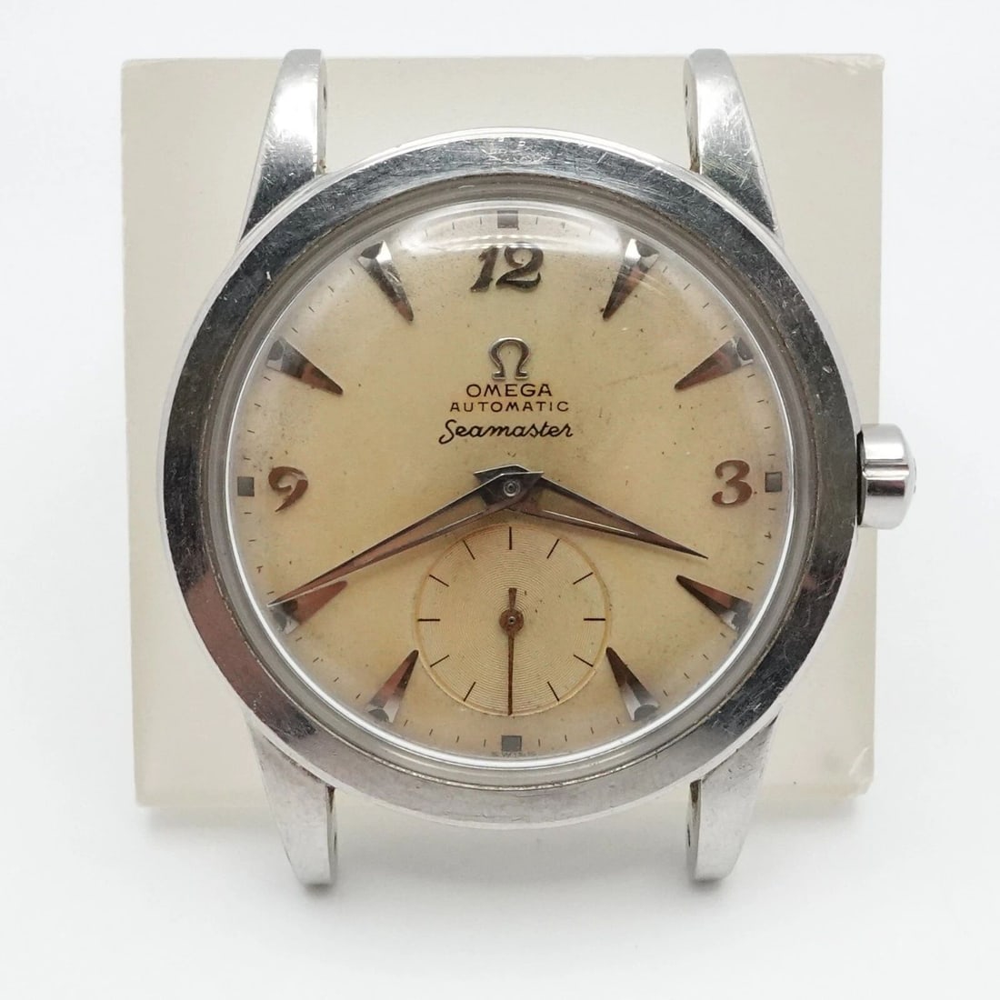 OMEGA SEAMASTER 2576-12 AUTOMATIC WATCH - 34MM HEAD ONLY: OMEGA SEAMASTER 2576-12 AUTOMATIC WATCH - 34MM HEAD ONLY Omega Seamaster Automatic Watch Case Size - 34mm Ref 2576-12 Head Case Only Sold As Is For Parts/Repair Box or Papers NOT Included