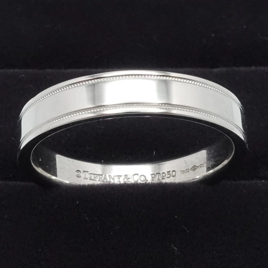TIFFANY & CO. PLATINUM DOUBLE MILGRAIN 4MM BAND RING SIZE 8.5 BOX & RECEIPT: TIFFANY & CO. PLATINUM DOUBLE MILGRAIN 4MM BAND RING SIZE 8.5 BOX & RECEIPT Tiffany & Co. Platinum 950 Double Milgrain 4mm Band Ring No Engraving Size - 8.5 Band Width - 4mm Depth - 1.5mm Thick Total 