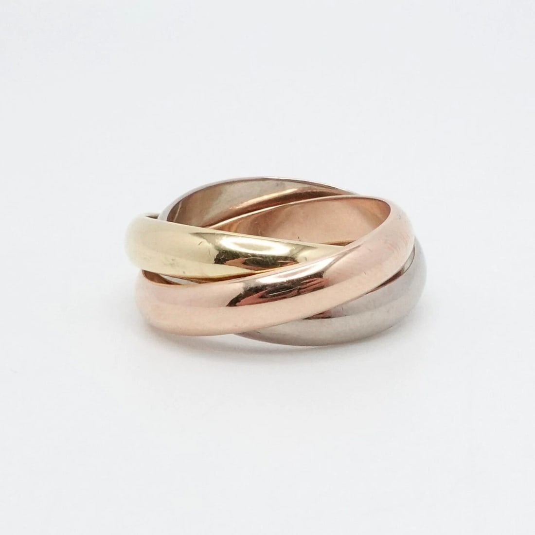 CARTIER 18K TRI COLOR GOLD CLASSIC TRINITY BAND RING SIZE 51: Cartier 18K Tri Color Gold Trinity Band Ring Size - Size 51 (6 U.S) Finger Circumference - 2.05" Band Width - 3.5mm approx. Total Weight - 10.8 Grams Hallmark - Cartier 750 51 Serial # CG**** Looks Gr