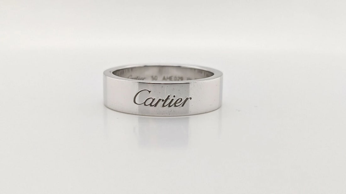 C DE CARTIER PLATINUM WEDDING BAND 5MM - SIZE 50 - US SIZE 5.25 - BOX & PAPERS: C De Cartier Platinum Wedding Band Reference - B4210150 Width - 5mm Size - 50 US Size - 5.25 Total Weight - 8.2 Grams Retail Price - $2760.00 + Tax Professionally Polished & Looks Brand New Original B