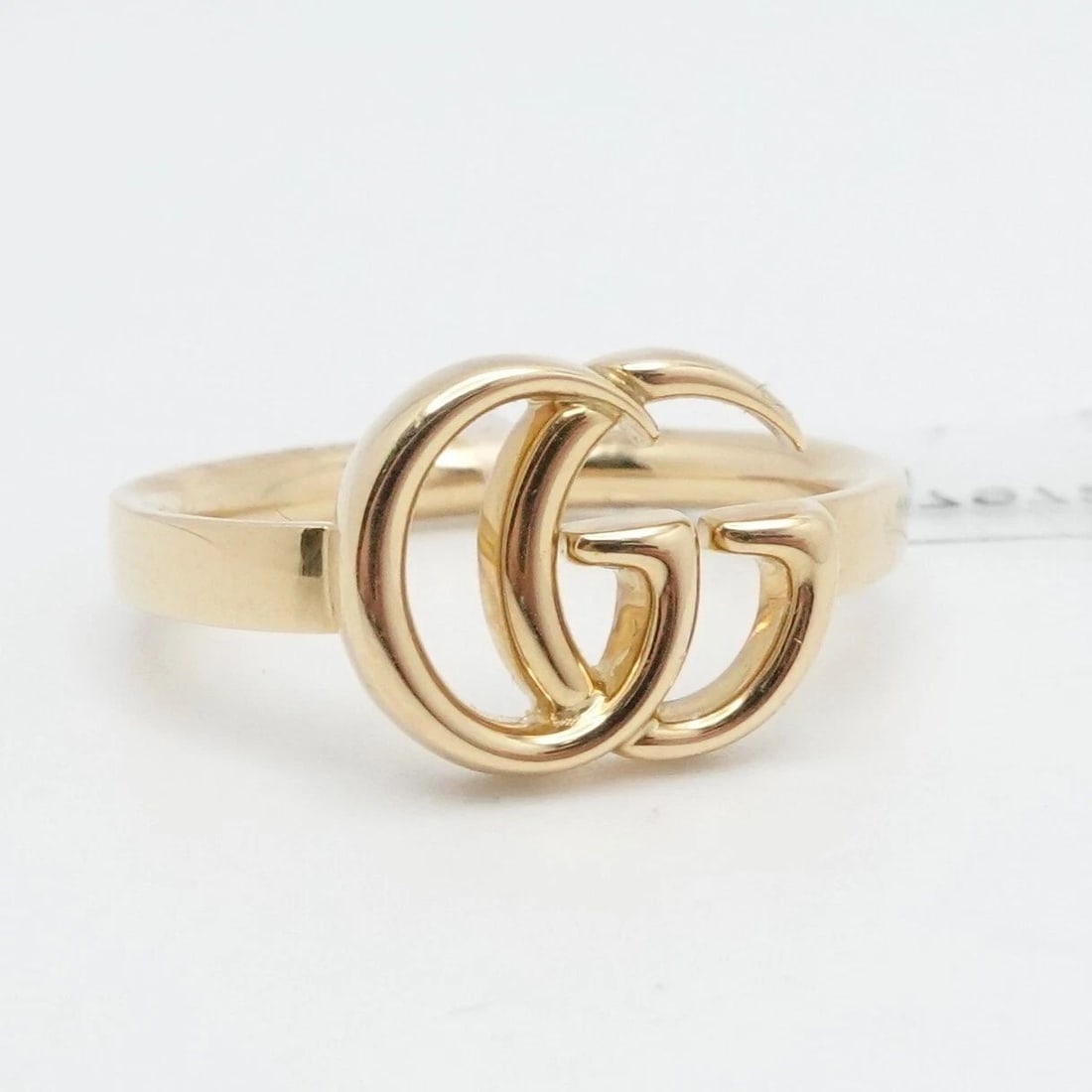 GUCCI 18K YELLOW GOLD GG LOGO RUNNING BAND RING - SIZE 15 US 7.25 WITH TAG: GUCCI 18K YELLOW GOLD GG LOGO RUNNING BAND RING - SIZE 15 US 7.25 WITH TAG Authentic GUCCI 18K Yellow Gold GG Logo Running Band Ring Size - 15 | US 7.25 Band Width - 2.5mm Logo Size (L X W) - 10mm x 1