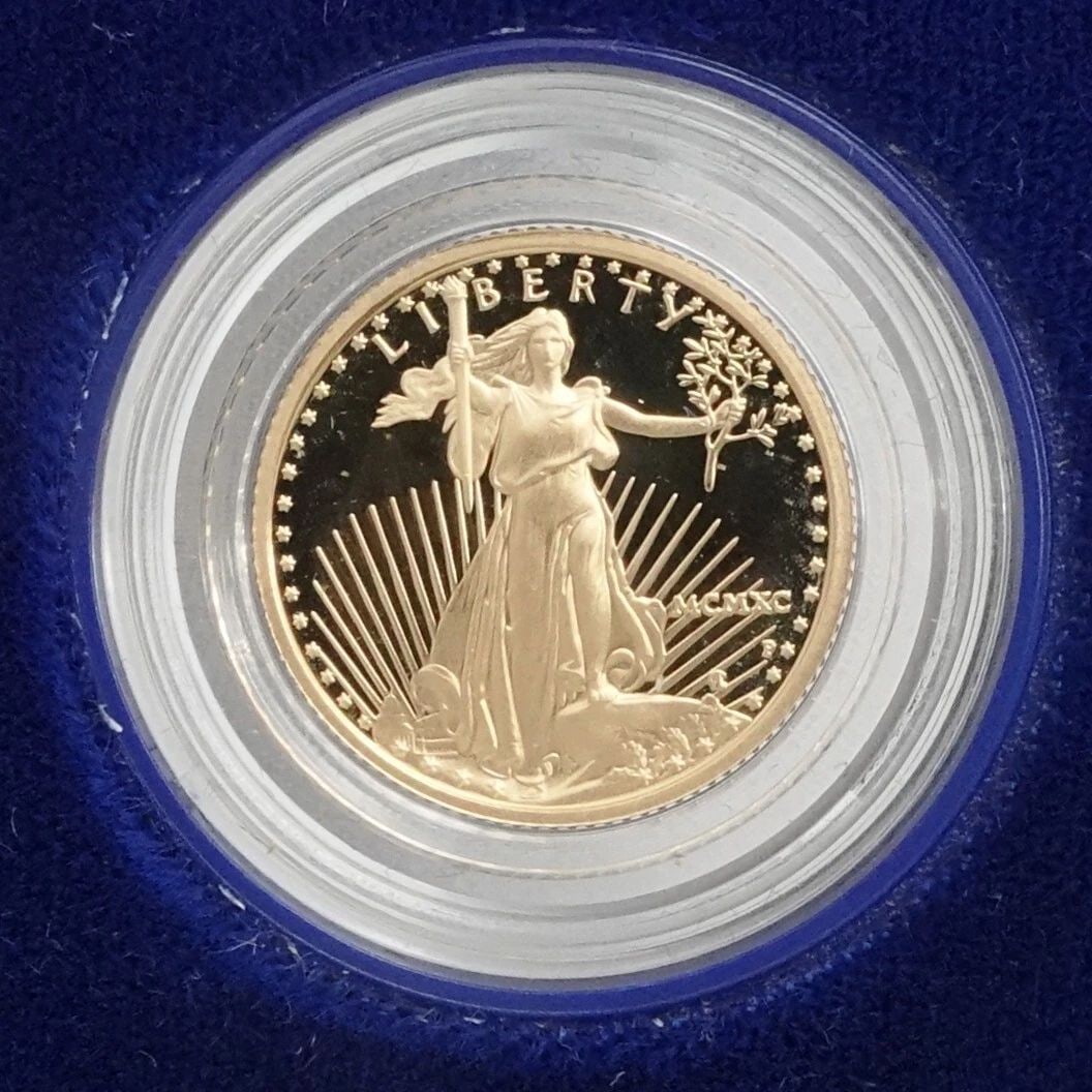 1990 P AMERICAN EAGLE 1/10 OZ. GOLD $5 COIN OGP COA: 1990 P American Eagle 1/10 Troy Oz. Gold $5 Coin Diameter - 16.50 Weight - 3.393 Grams Composition - 91.67% Gold | 3% Silver | 5.33% Bal. Copper OGP Blue Velvet Case & COA Included