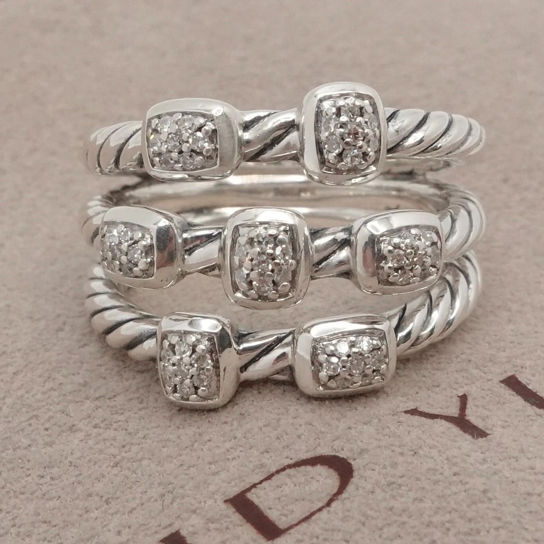 DAVID YURMAN CONFETTI STERLING SILVER PAVE DIAMOND CABLE NARROW BAND RING 6.25: David Yurman Confetti Sterling Silver Pave Diamond Cable Three-Row Narrow Band Ring Size - 6.25 Band Width - 5.5mm Total Height - 15mm Est. Retail Price - $895 USD + Tax Total Weight - 9 Grams Very Gr