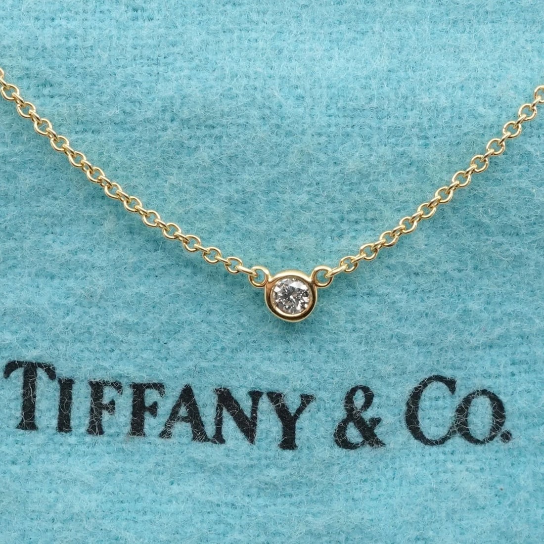 TIFFANY & CO. PERETTI DIAMONDS BY THE YARD SINGLE BRILLIANT DIAMOND NECKLACE 16": TIFFANY & CO. PERETTI DIAMONDS BY THE YARD SINGLE BRILLIANT DIAMOND NECKLACE 16" Tiffany & Co. Elsa Peretti Diamonds By The Yard Bezel Round Brilliant Cut Solitaire Necklace Length - 16" Long Chain Wi