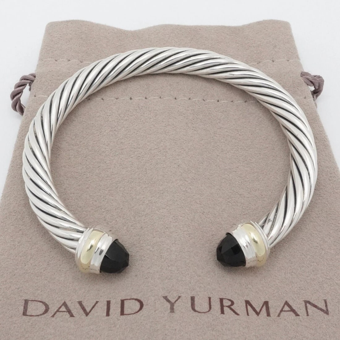 DAVID YURMAN STERLING SILVER 14K YELLOW GOLD ONYX 7MM CABLE CUFF MEDIUM BRACELET: David Yurman Cable Classic Sterling Silver & 14K Yellow Gold Black Onyx Gemstone Cuff Medium Bracelet Fits up to Relax 6" - 6.5" Snug Wrist Width - 7mm Thick Est. Retail - $800 USD Total Weight - 40.3