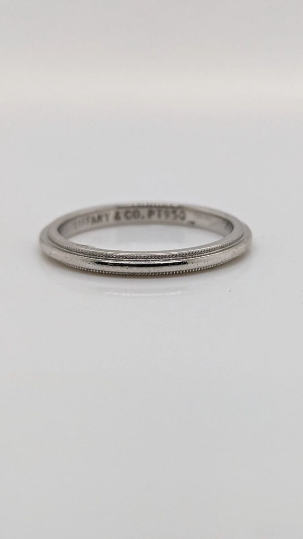 TIFFANY & CO. TOGETHER PLATINUM 2MM MILGRAIN WEDDING BAND RING SIZE 5.5: Tiffany & Co. Tiffany Together Platinum Milgrain Wedding Band Ring Ring Size - 5.5 Width - 2mm Weight - 3.3 Grams Professionally polished & Looks like New Pouch Not Included