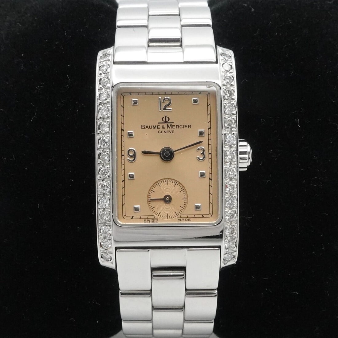 BAUME & MERCIER MV045139 HAMPTON DIAMOND BEZEL QUARTZ LADIES WATCH - 20MM X 39MM: BAUME & MERCIER MV045139 HAMPTON DIAMOND BEZEL QUARTZ LADIES WATCH - 20MM X 39MM Baume & Mercier Ref # MV045139 Hampton Copper/Salmon Dial Diamond Bezel Ladie's Quartz Watch with aftermarket diamond b