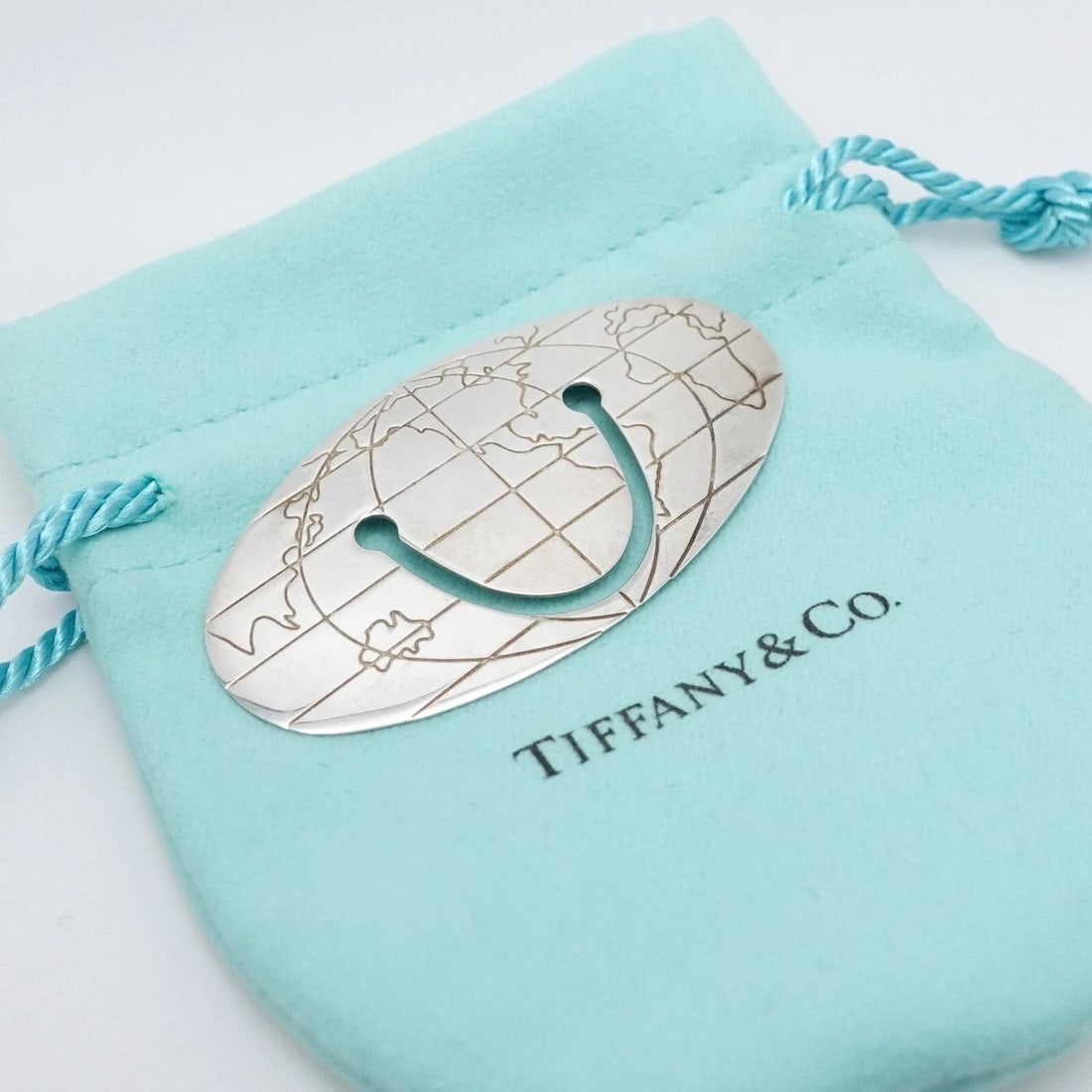 TIFFANY & CO. STERLING SILVER WORLD GLOBE OVAL BOOKMARK (1 of 2)