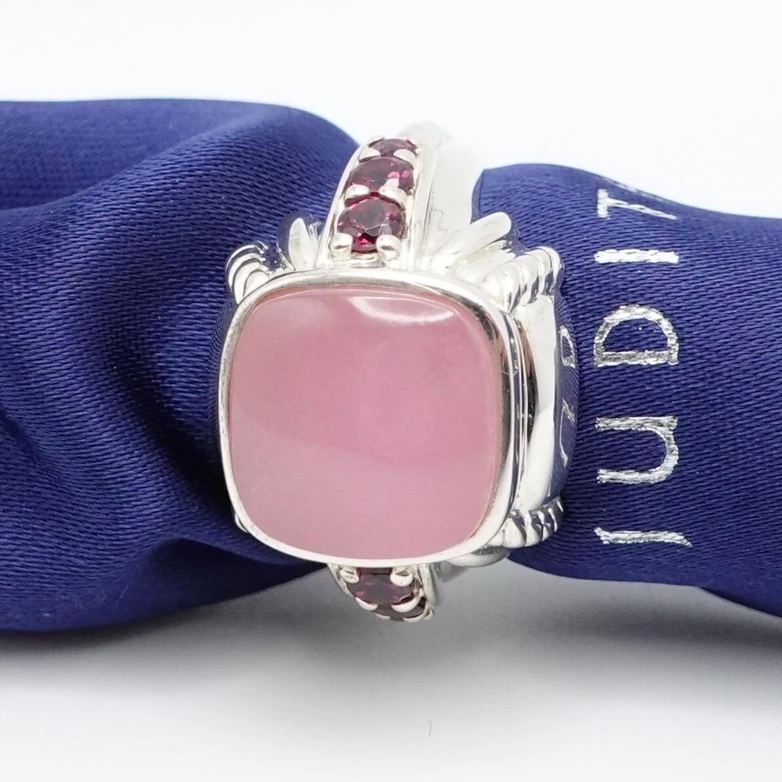 JUDITH RIPKA STERLING SILVER PINK JADE RHODOLITE CABOCHON RING - SIZE 8.25 BOX: JUDITH RIPKA STERLING SILVER PINK JADE RHODOLITE CABOCHON RING - SIZE 8.25 BOX Judith Ripka Sterling Silver Pink Jade & Rhodolite Cabochon Ring Size - 8.25 Band Width - 3mm Total Weight - 10 Grams wit