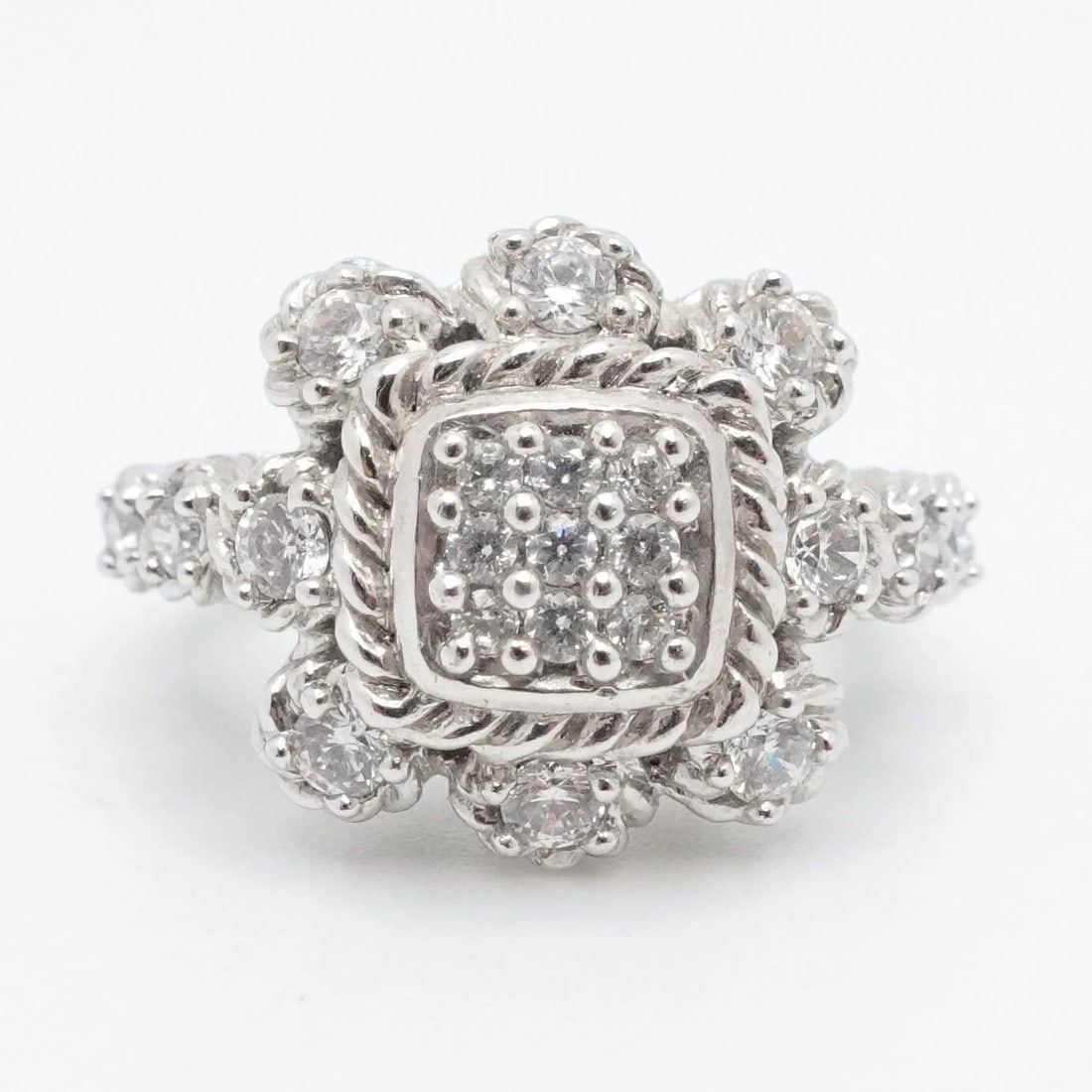 JUDITH RIPKA STERLING SILVER PAVE CLEAR CUBIC ZIRCONIA FLOWER RING SIZE 6.25: JUDITH RIPKA STERLING SILVER PAVE CLEAR CUBIC ZIRCONIA FLOWER RING SIZE 6.25 Judith Ripka Sterling Silver Pave Clear Cubic Zirconia Flower Cocktail Ring Size - 6.25 Band Width - 3mm Height - 15mm Tota