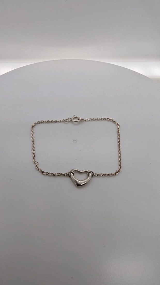 TIFFANY & CO. ELSA PERETTI STERLING SILVER OPEN HEART DAINTY BRACELET - 5.75": Tiffany & Co. Elsa Peretti Sterling Silver Open Heart Dainty Bracelet Length - 5.75" Long Total Weight - 1.2 Grams