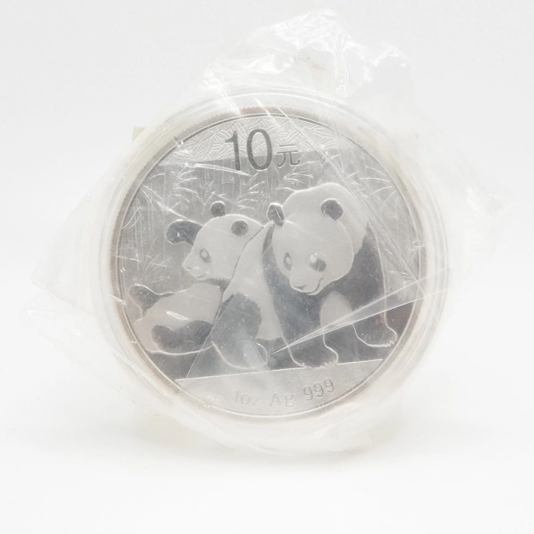 2011 CHINA PANDA SILVER 10 YUAN COIN - CAPSULATED & SEALED #Q4: 2011 CHINA PANDA SILVER 10 YUAN COIN - CAPSULATED & SEALED #Q4 2011 China Panda Silver 10 Yuan Coin Looks Great Capsulated & Sealed **Coins have not been opened or touched from their capsule. Please n