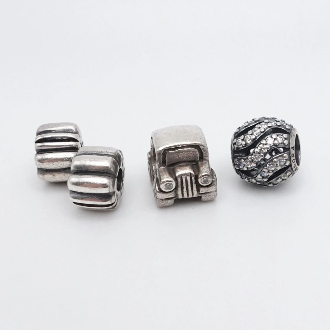 AUTHENTIC PANDORA STERLING SILVER CAR WINTER WISP RIBBED PAIR CLIP CZ CHARMS: PANDORA STERLING SILVER CAR WINTER WISP RIBBED PAIR CLIP CLEAR CZ RETIRED CHARMS Authentic Pandora Sterling Silver Car, Winter Wisp, & Ribbed Pair Clip Clear CZ Retired Charm Style # 790405CZ, 790163,