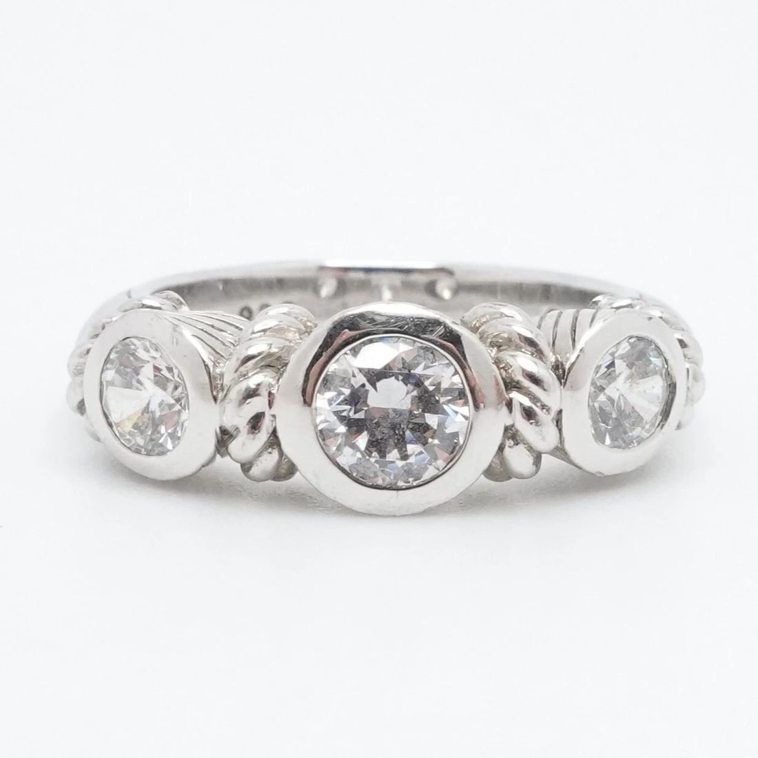 JUDITH RIPKA STERLING SILVER 3 ROUND CLEAR CUBIC ZIRCONIA CABLE RING SIZE 6.25: JUDITH RIPKA STERLING SILVER 3 ROUND CLEAR CUBIC ZIRCONIA CABLE RING SIZE 6.25 Judith Ripka Sterling Silver 3 Round Clear Cubic Zirconia Cable Ring Size - 6.25 Band Width - 3mm Height - 7mm Total Weig