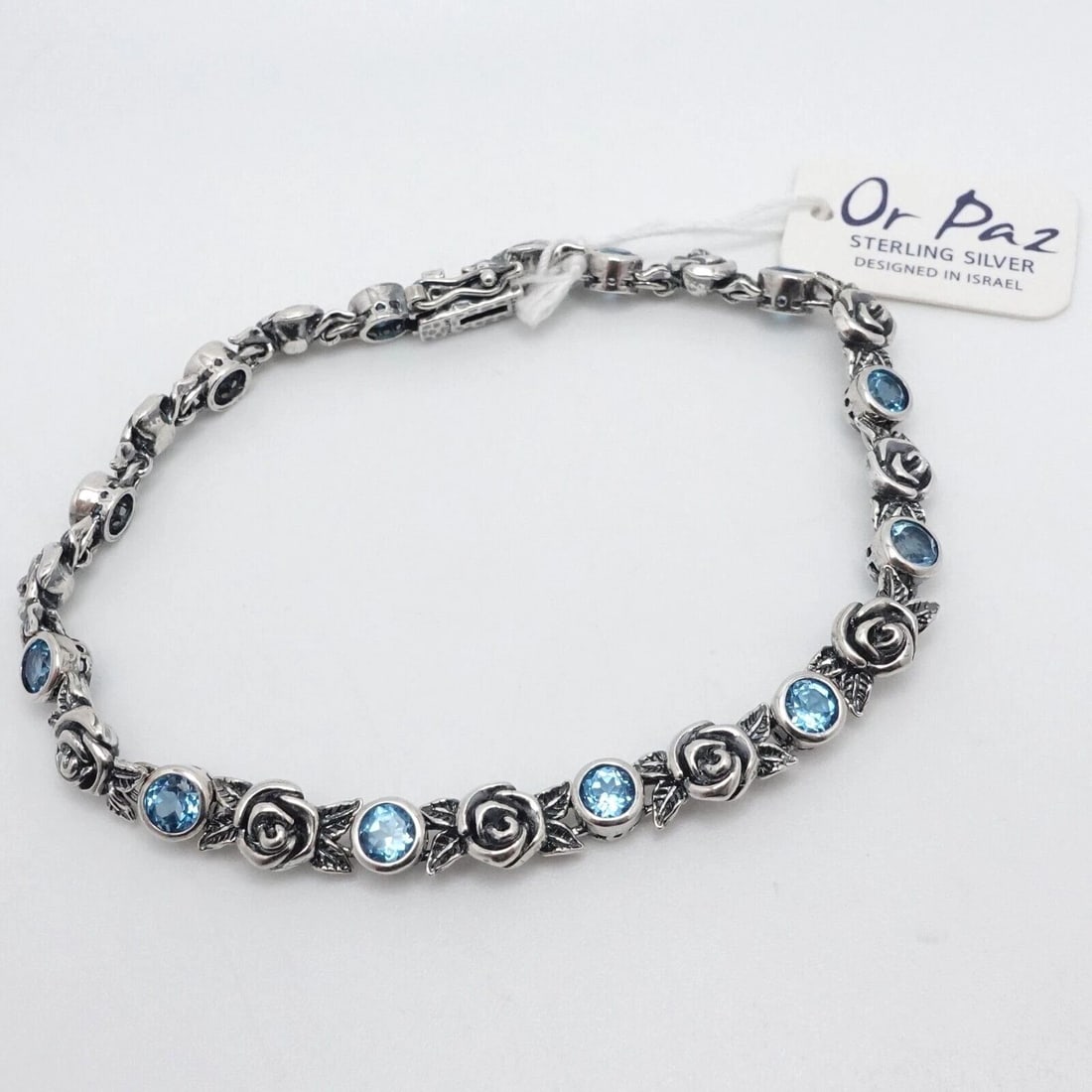 OR PAZ STERLING SILVER BLUE TOPAZ ROSE FLOWER CHAIN BRACELET - 7.5" LONG NWT: OR PAZ STERLING SILVER BLUE TOPAZ ROSE FLOWER CHAIN BRACELET - 7.5" LONG NWT Or Paz Sterling Silver Blue Topaz Rose Flower Chain Bracelet Length - 7.5" Long Wrist - Relax 6.75" - 7" Snug fit Chain Wid