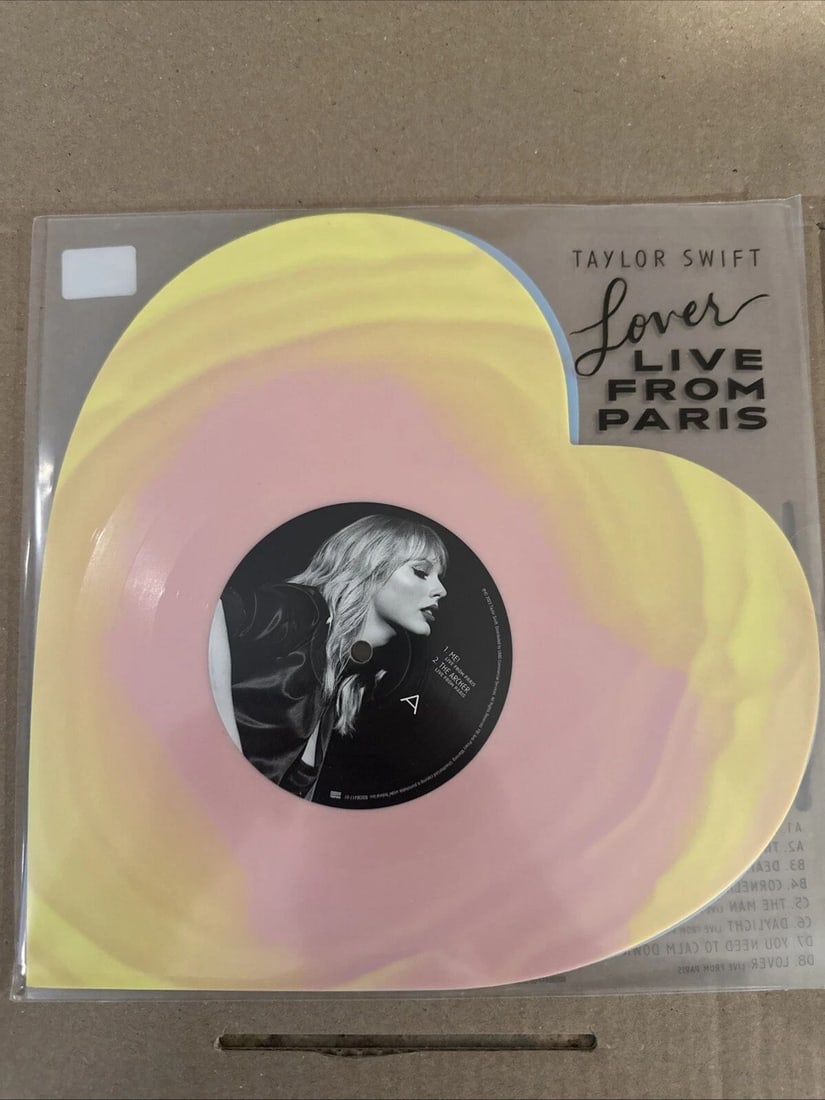 TAYLOR SWIFT LOVER (LIVE FROM PARIS) HEART SHAPED VINYL ON HAND - FAST SHIP: TAYLOR SWIFT LOVER (LIVE FROM PARIS) HEART SHAPED VINYL ON HAND ? - FAST SHIP Taylor Swift Lover Live From Paris Heart Shaped Vinyl LP ON HAND ALL SALES ARE FINAL Any Cancelation Requests Will Be Deni
