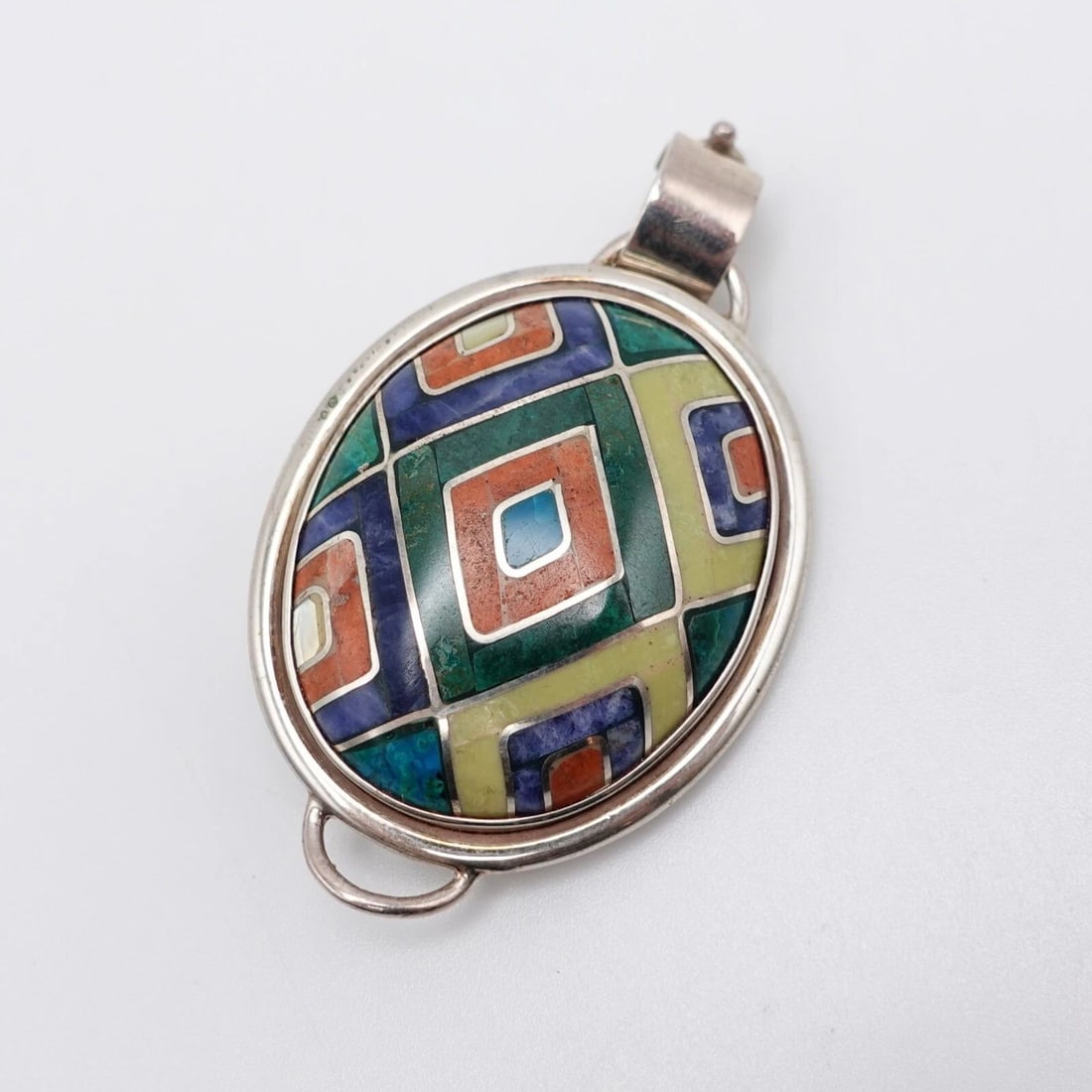 SILVER 950 PERU MULTI GEMSTONE INLAY OVAL PIN BROOCH PENDANT - 2": SILVER 950 PERU MULTI GEMSTONE INLAY OVAL PIN BROOCH PENDANT - 2" Silver 950 Peru Multi Gemstone Inlay Oval Pin Brooch Pendant Height - 2" Length - 1.25" Bail Height - 9mm Bail Width - 6mm Total Weigh
