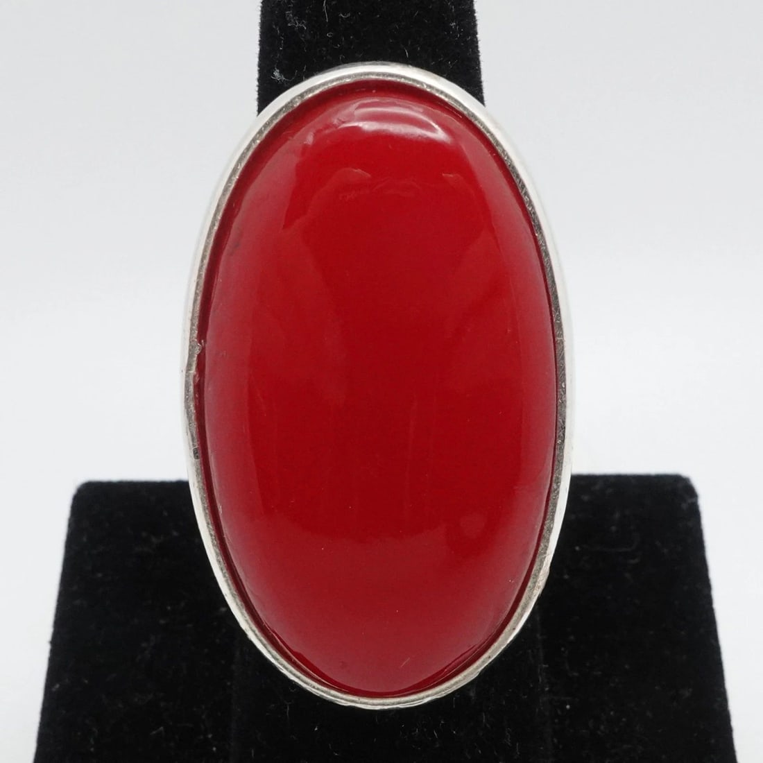 STERLING SILVER RED STONE CABOCHON LONG RING SIZE 6.75: STERLING SILVER RED STONE CABOCHON LONG RING SIZE 6.75 Sterling Silver Red Chalcedony Cabochon Long Ring Size - 6.75 Band Width - 4mm Height - 1.5" Total Weight - 13.7 Grams Hallmark - 925