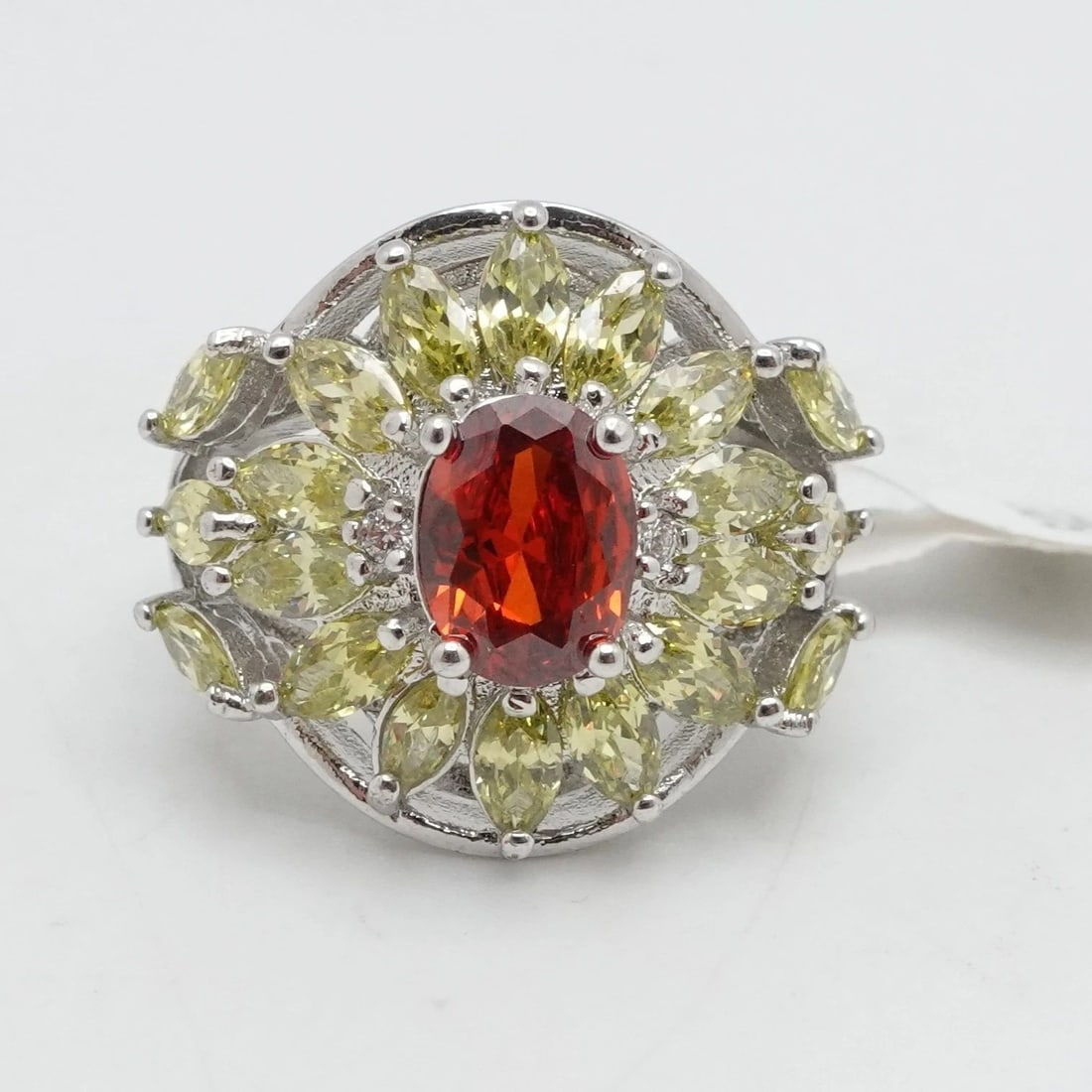 STERLING SILVER GARNET & CITRINE CLUSTER FLOWER COCKTAIL RING SIZE 7: STERLING SILVER GARNET & CITRINE CLUSTER FLOWER COCKTAIL RING SIZE 7 Sterling Silver Garnet & Citrine Flower Cluster Cocktail Ring Size - 7 Band Width - 2.5mm Height - 19mm Total Weight - 6.6 Grams