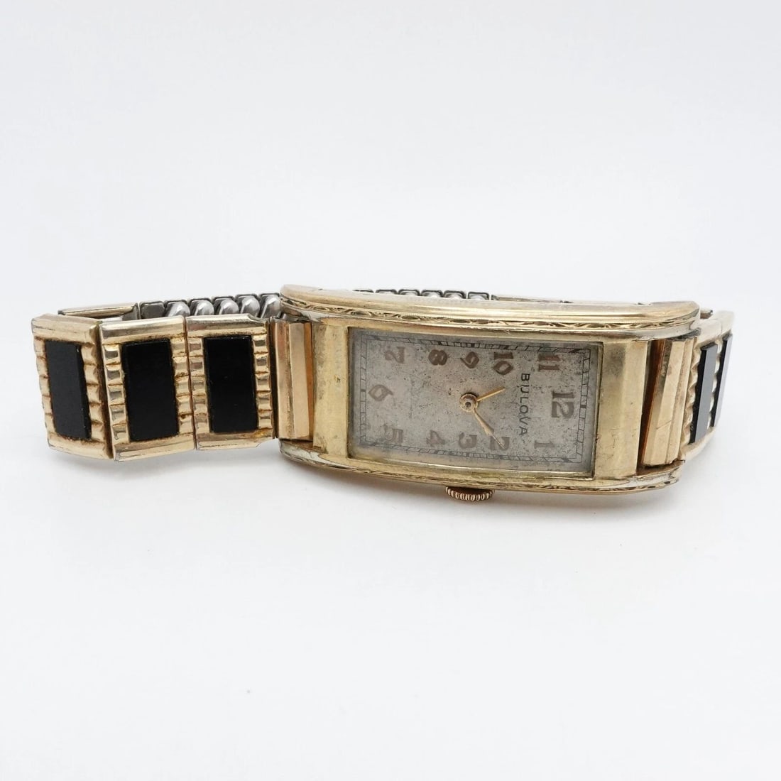 BULOVA 10K YELLOW GOLD FILLED CURVED MANUAL WATCH - 20MM X 40MM PARTS REPAIR: Vintage Bulova 10K Yellow Gold Filled Art Deco Style with 1/20 10K Gold Filled Tops Speidel Expandable Bracelet Curved Manual Watch Case Size - 20mm x 40mm Fits up to 6.5" Wrist Back Case # 6136181 To