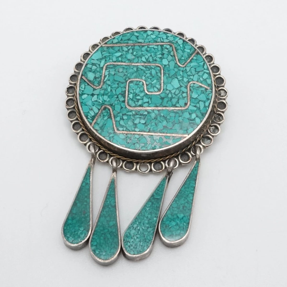 TAXCO STERLING SILVER MEXICO TURQUOISE INLAY BROOCH PENDANT 2.25": TAXCO STERLING SILVER MEXICO TURQUOISE INLAY BROOCH PENDANT 2.25" Taxco Sterling Silver Mexico Turquoise Inlay Brooch Pendant Length - 2.25" Width - 0.90" Depth - 5mm Thick Bail Height - 4mm Total Wei